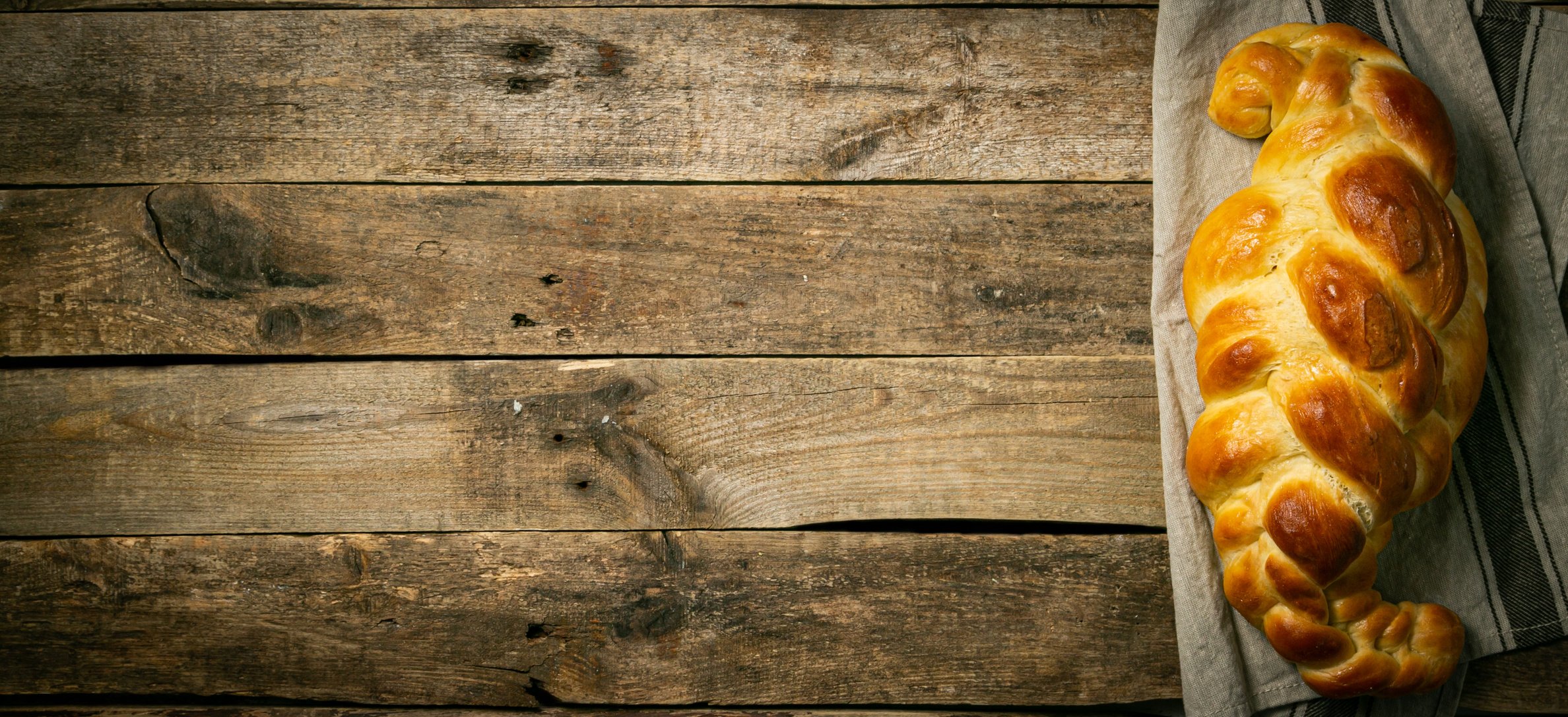Traditional Jewish Bread Challah on Wood Background